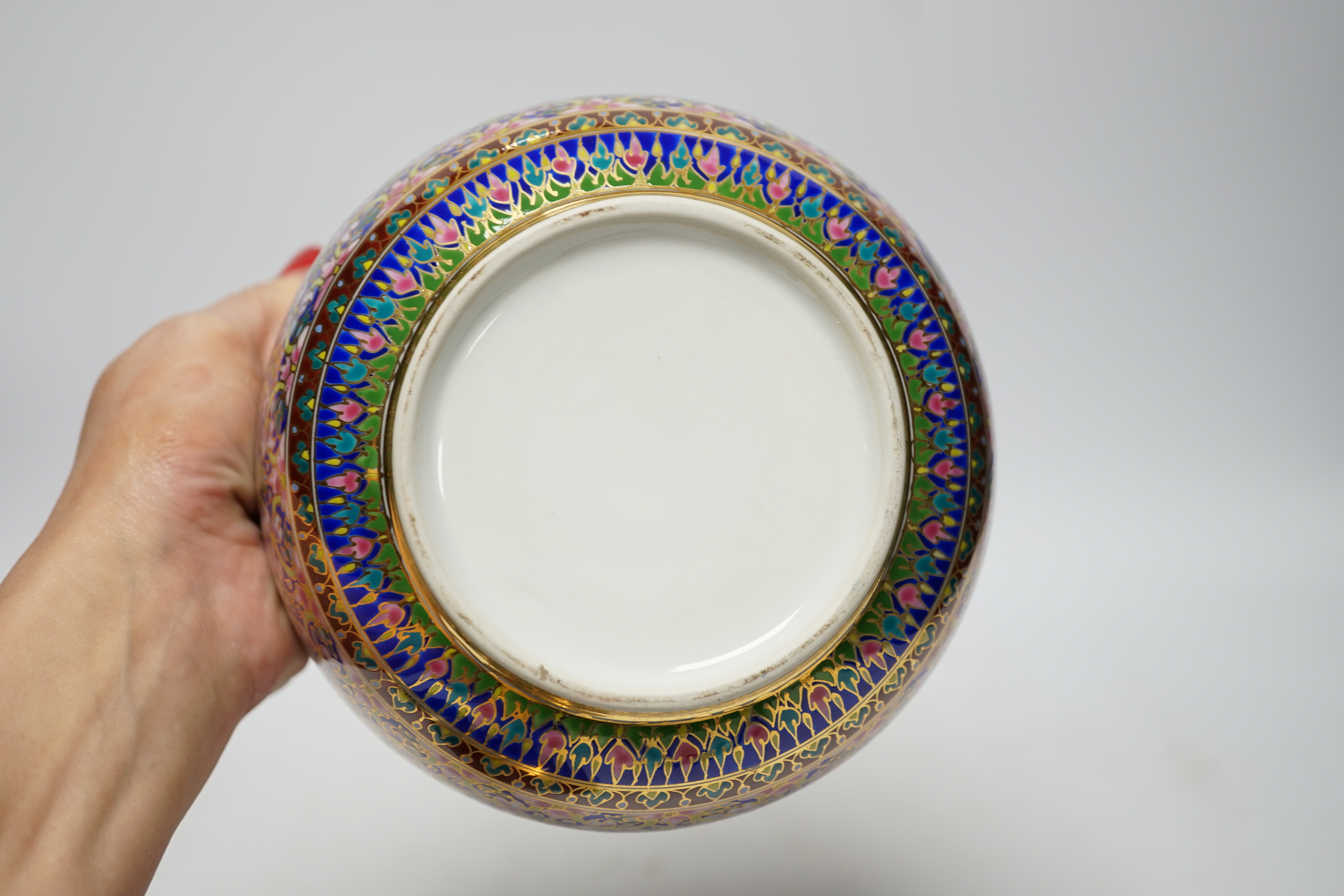 A Continental porcelain bowl and cover enamelled with flowers, 21cm high